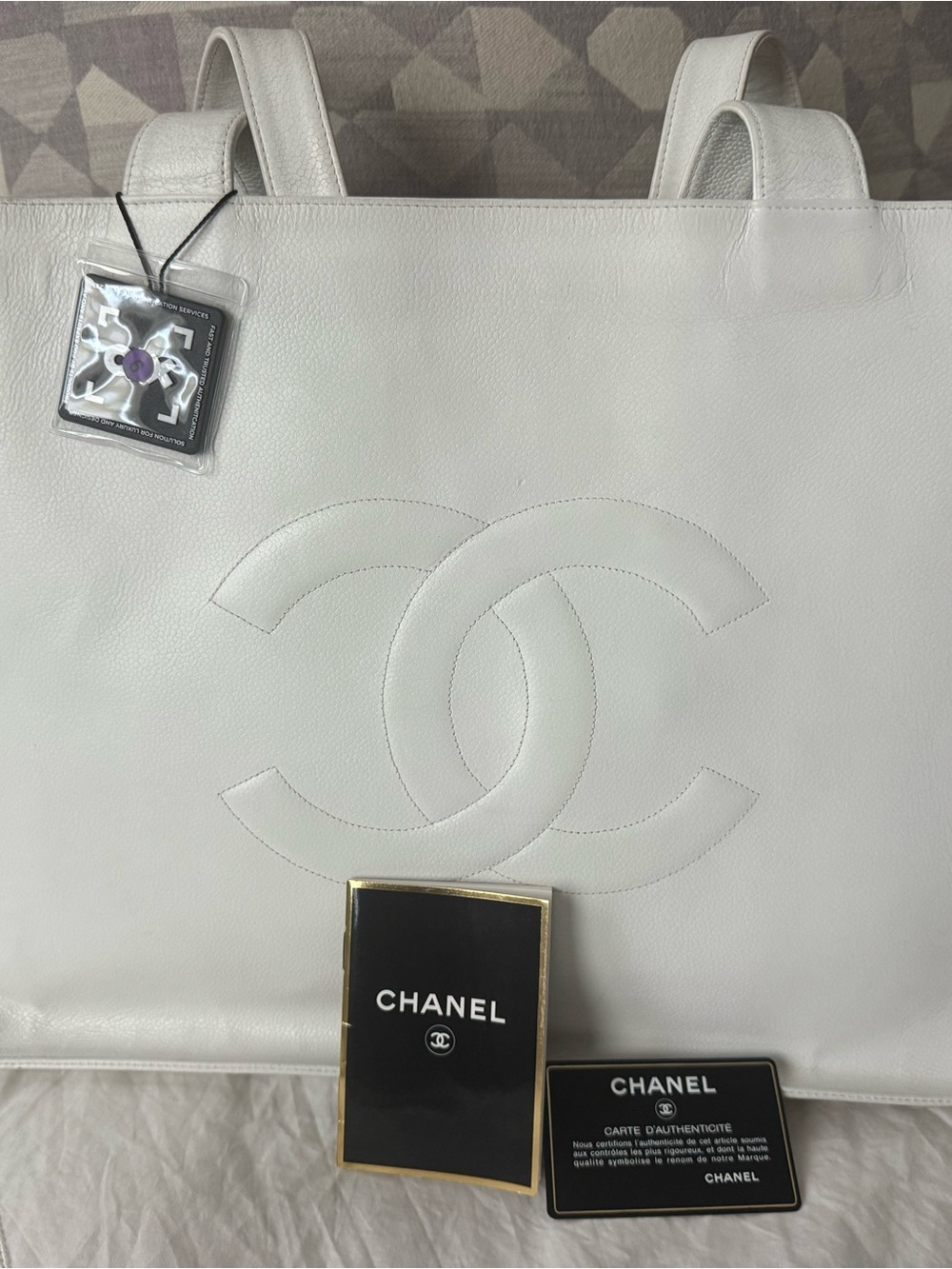 Authentic CHANEL White Leather Tote with Embossed CC Logo